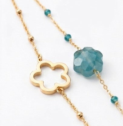 Macro fleur nacrée irisée vert émeraude contour ajouré doré bracelet double rangs