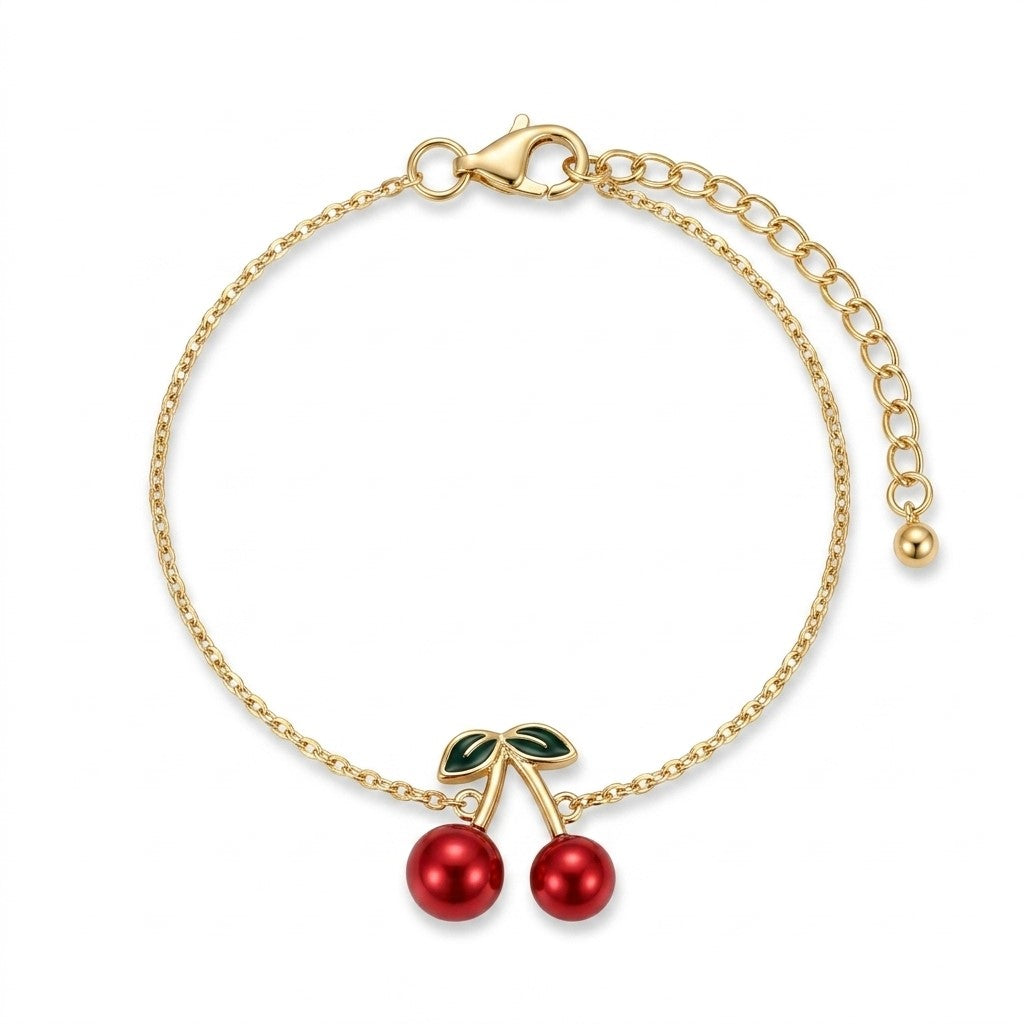 Bracelet cherry bomb doré fond blanc charm cerise 3D acier 316 hypoallergénique