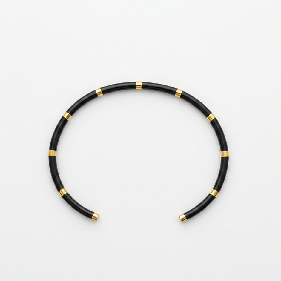 Jonc Mara bracelet fin tube en acier inoxydable couleur noir avec anneaux dorés – KD Softy Bijoux
